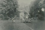 The Old Vicarage, Thurlby. Rev and Mrs Pettifer with friends. On lawn to south. Marked out as tennis court. 